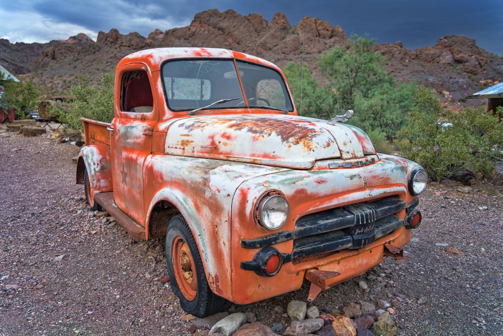 classic red vehicle during daytime