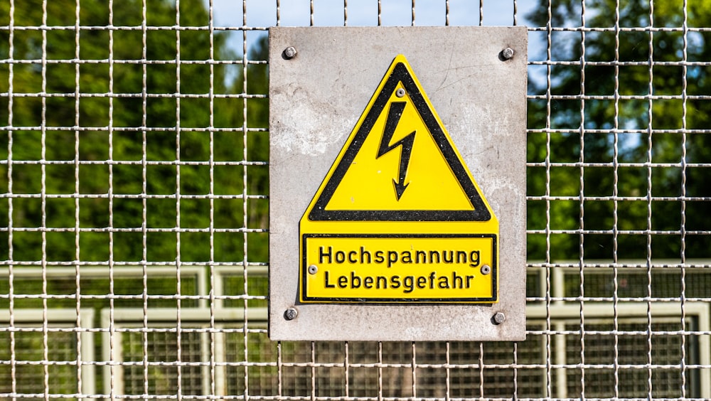 warning signage on fence
