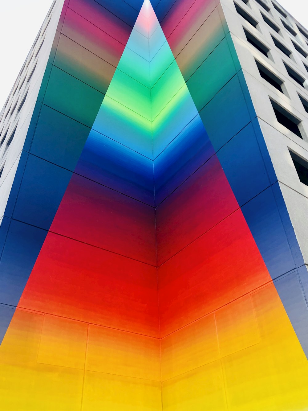 multicolored building in low-angle photography
