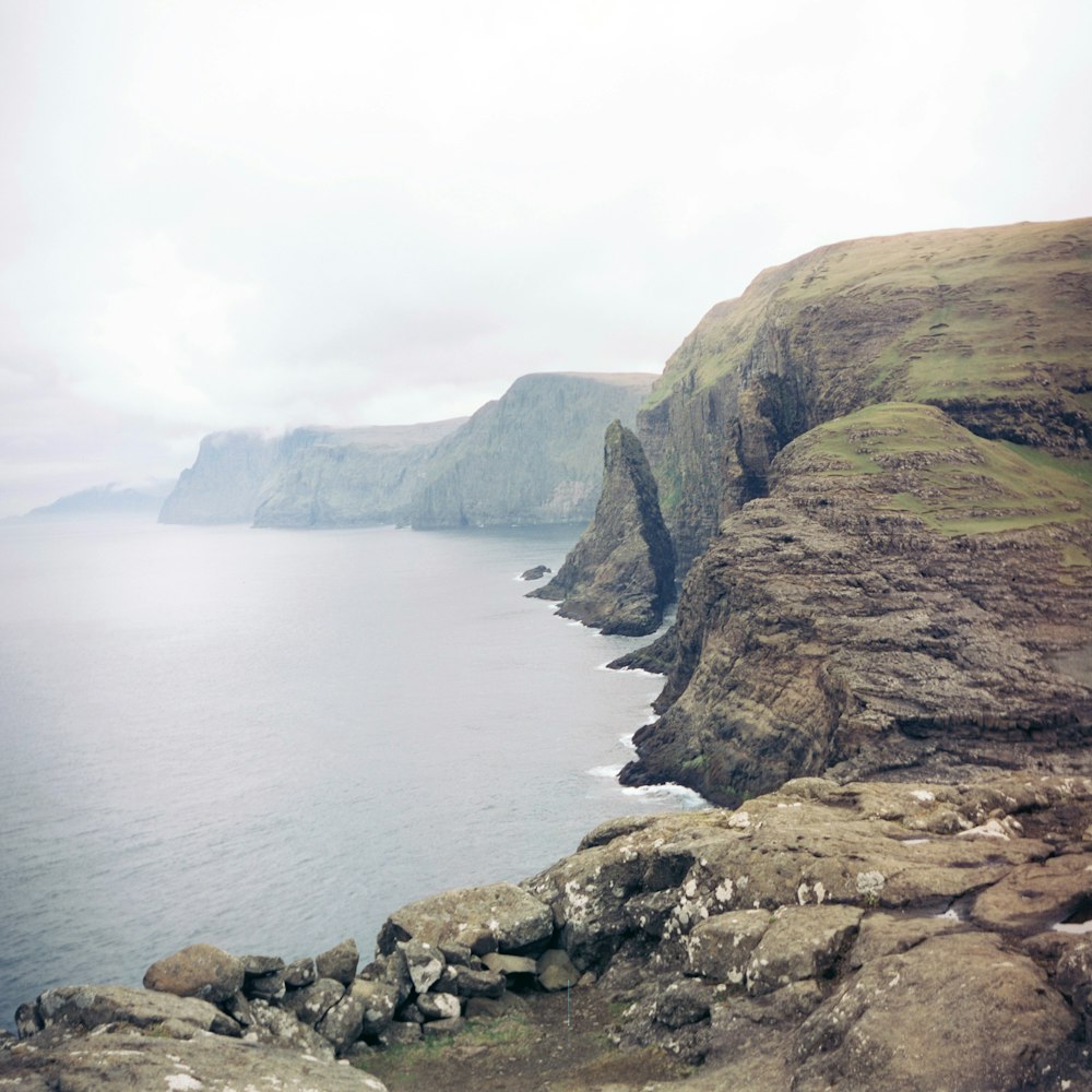 stone island and ocean during day