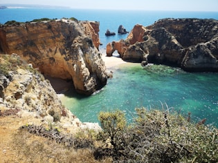 rock mountains near seashore