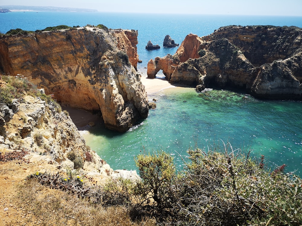 rock mountains near seashore