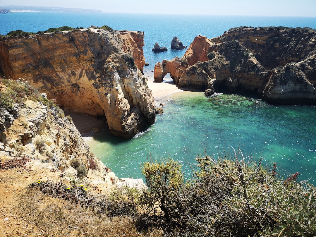 Algarve, Portugal - Algarve coastline with golden cliffs and turquoise water