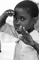 greyscale photography of boy