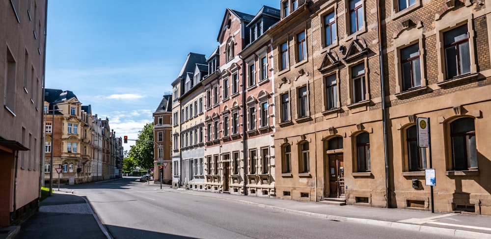 empty road and buildings during daytime