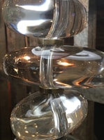 Various glass panels stacked neatly in a workshop