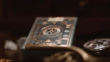 Artistic shot of a jofae product card with gold border glowing on hover