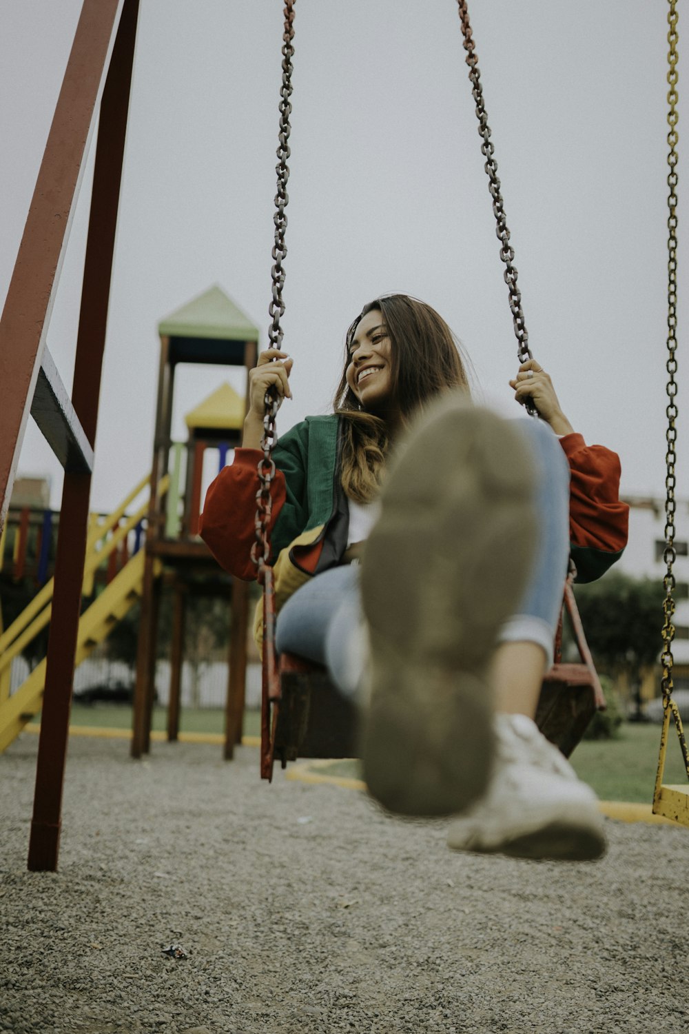 woman swinging at playground