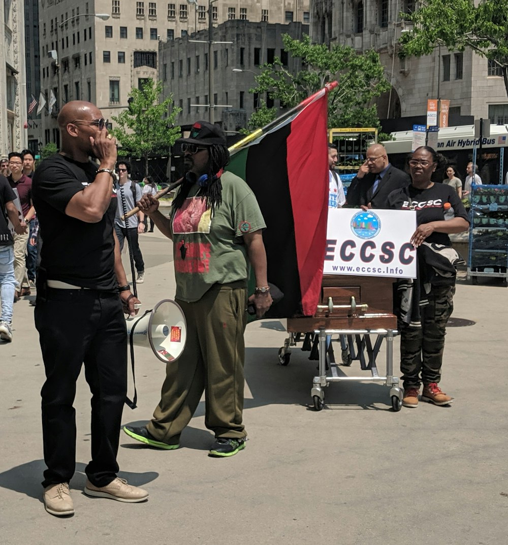 man carrying megaphone