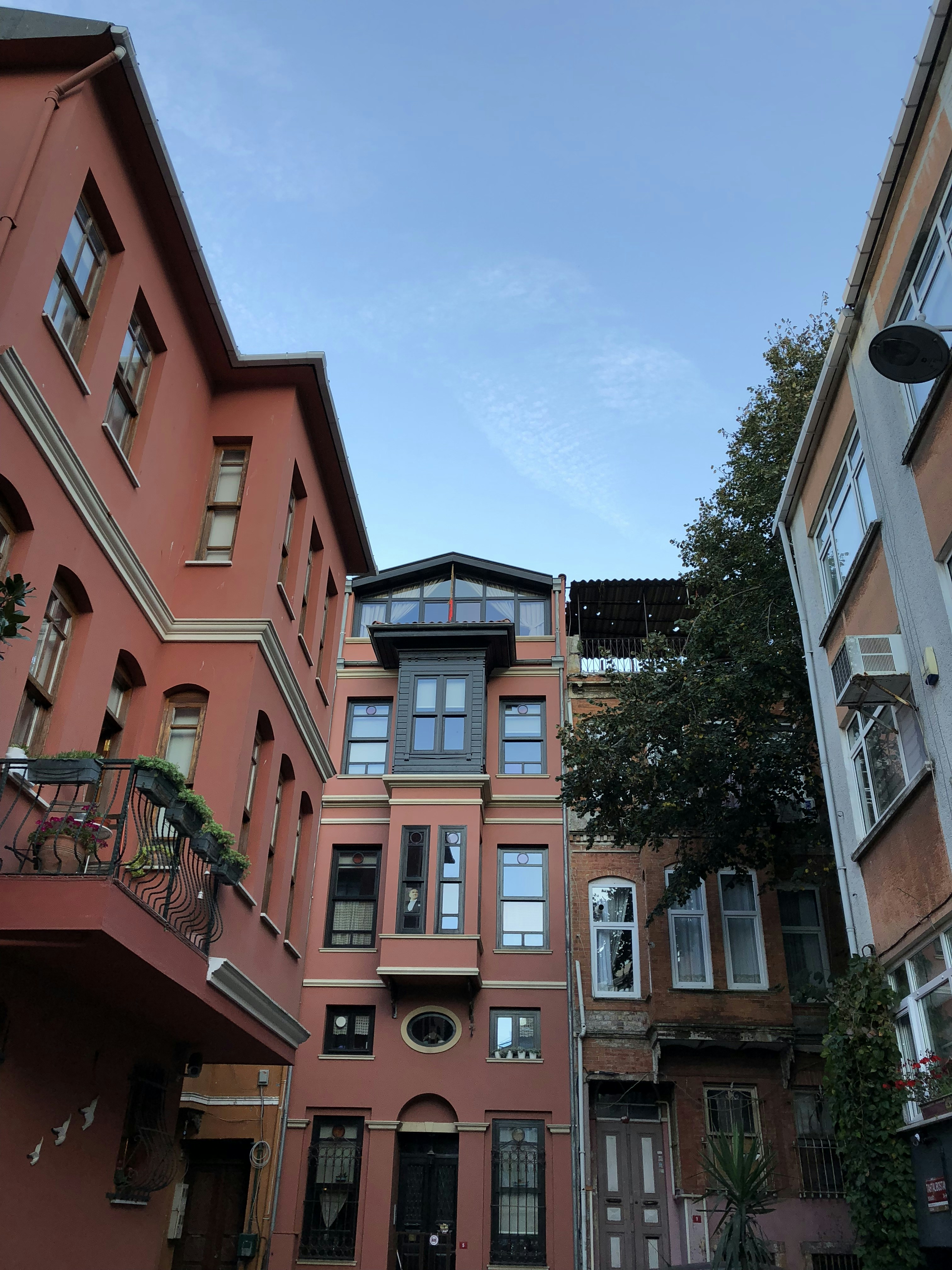 low-angle photography of red buildings