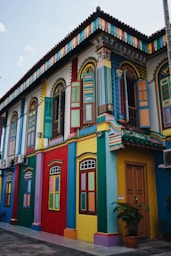 multicolored concrete buildings under blue skies