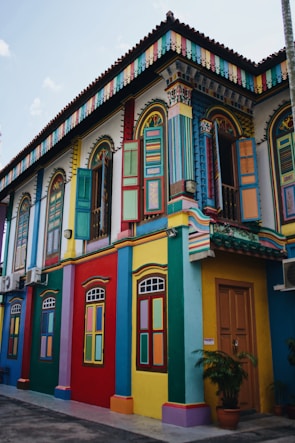 multicolored concrete buildings under blue skies