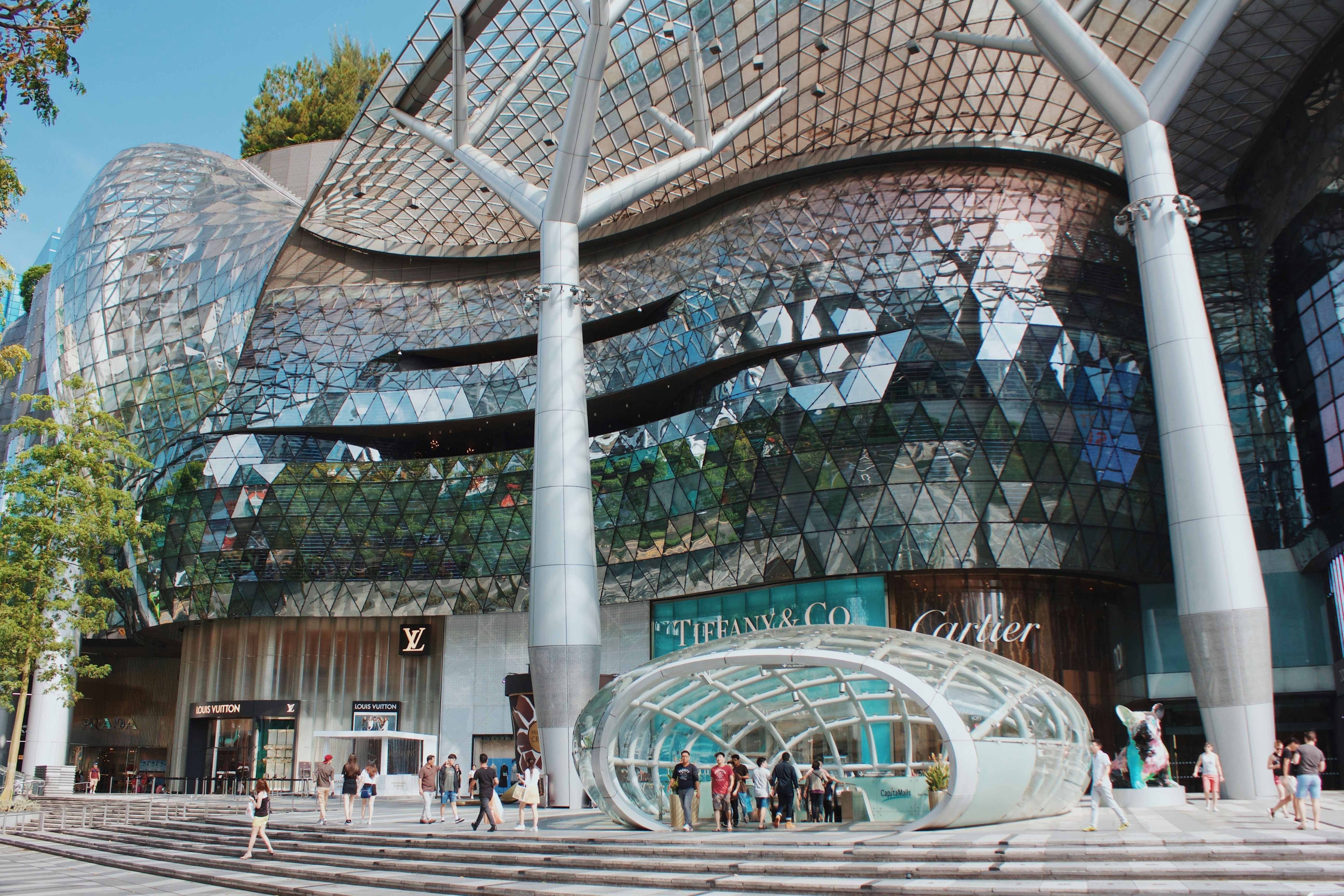 Exterior view of ION Orchard shopping mall on Orchard Road, Singapore, featuring luxury brands