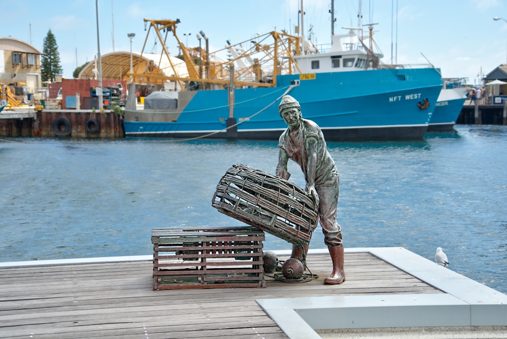 silver fisherman mime at the port