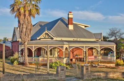 Front view of a classic Queenslander with wrap-around veranda.