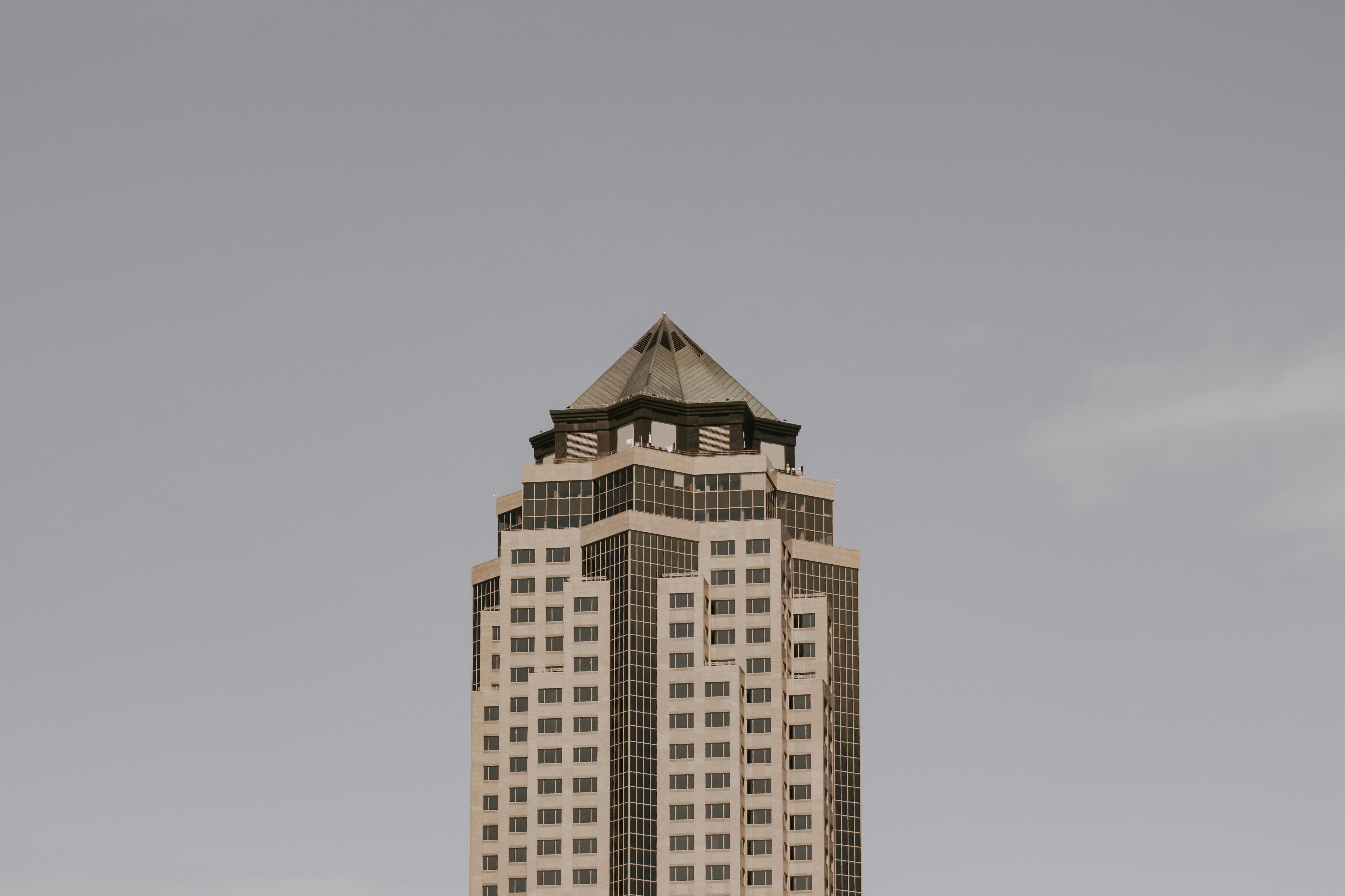 high-rise building under blue sky