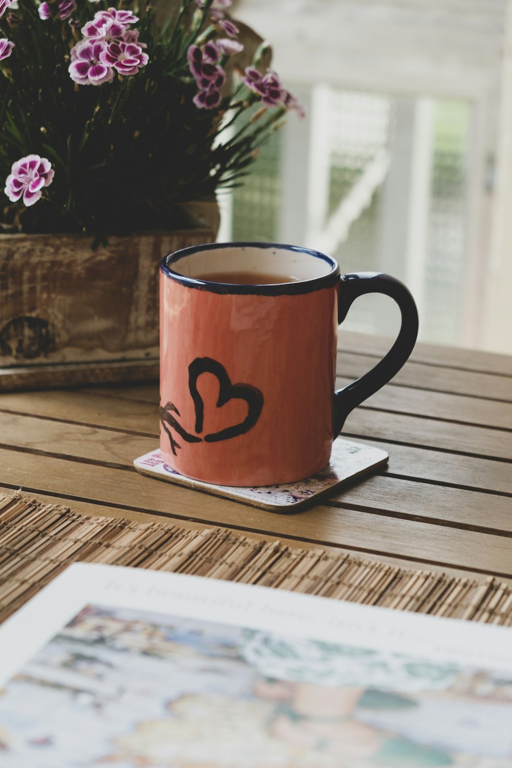 red ceramic mug