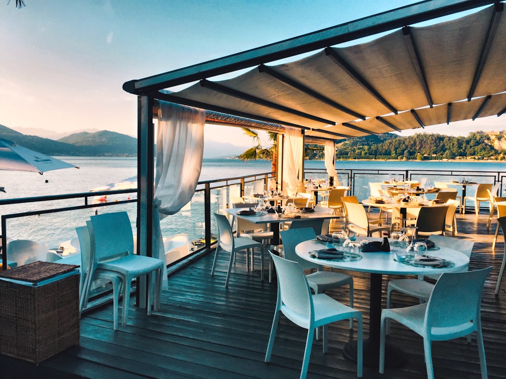 a restaurant with a view of the water