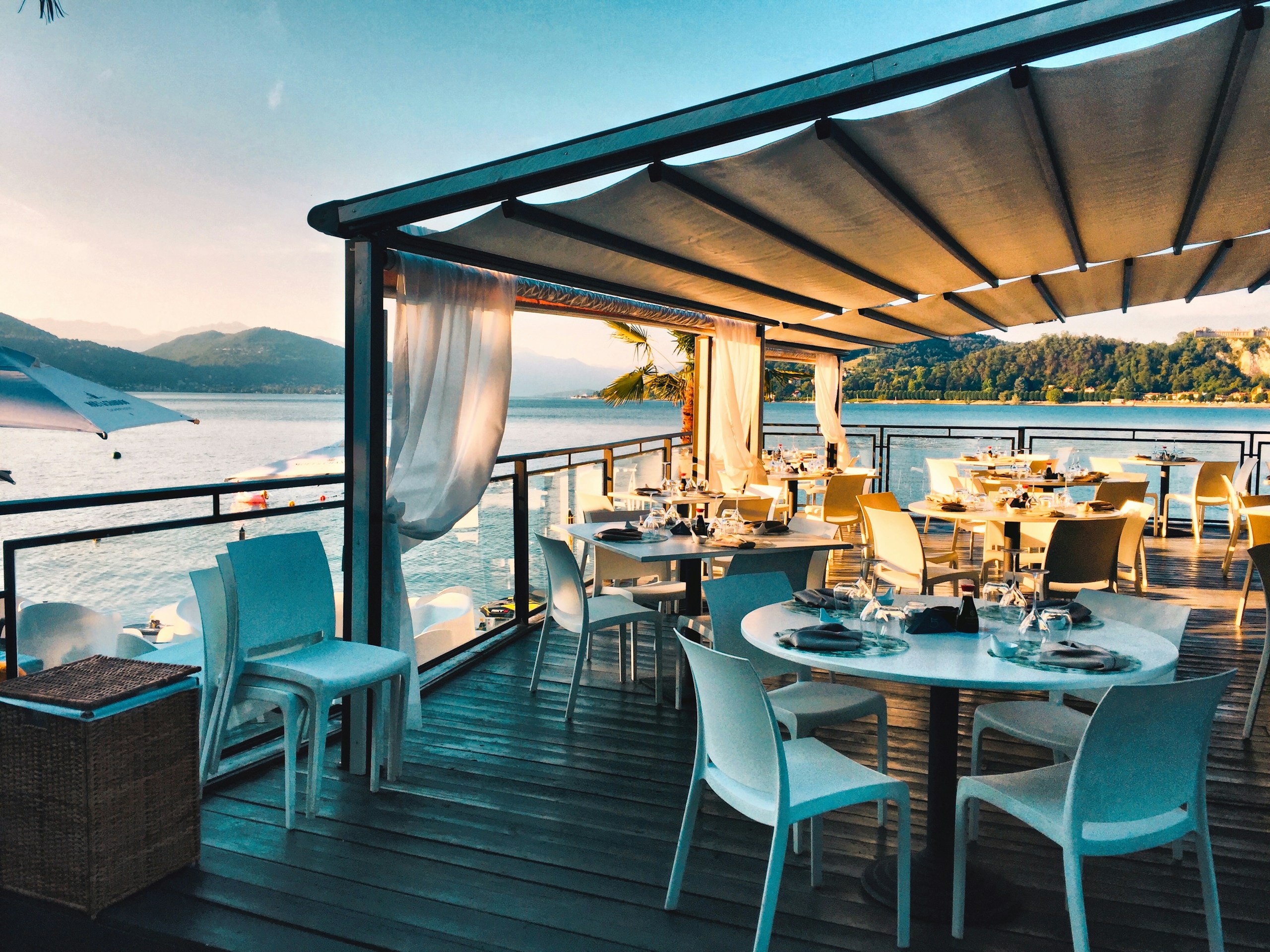 a restaurant with a view of the water