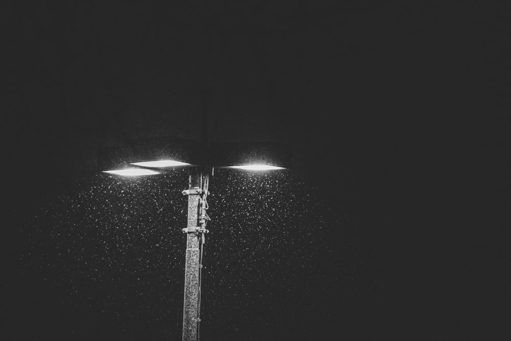 grayscale photo of post lamp
