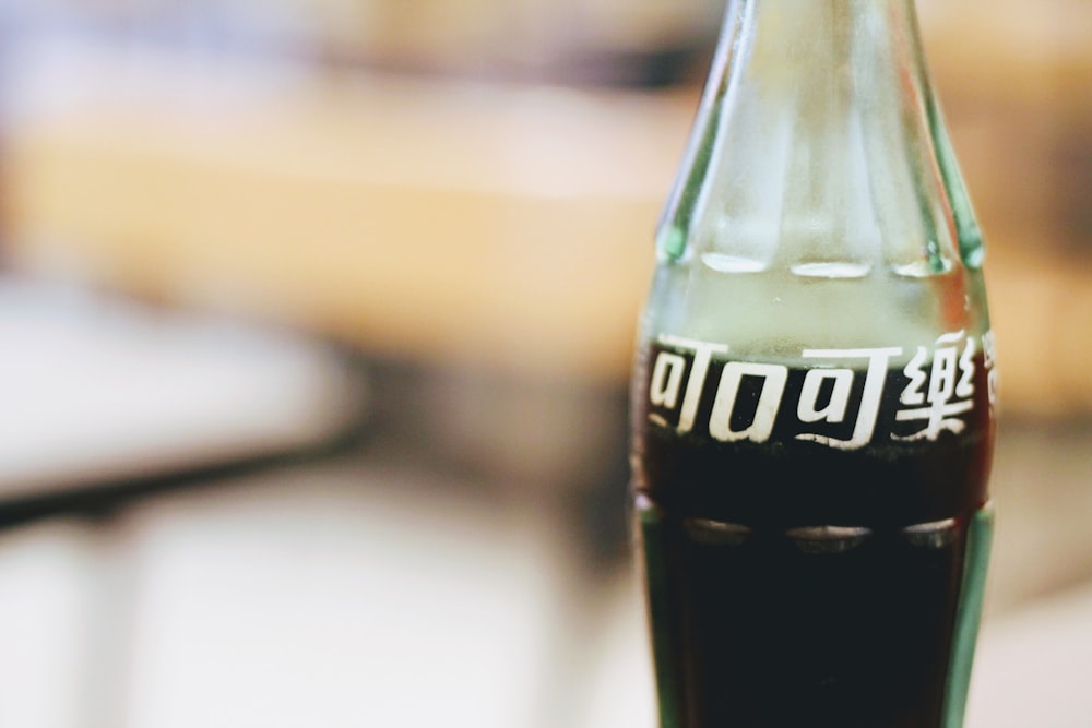 selective focus photography of glass of soda