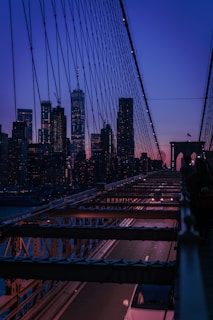 black and gray concrete bridge during night time