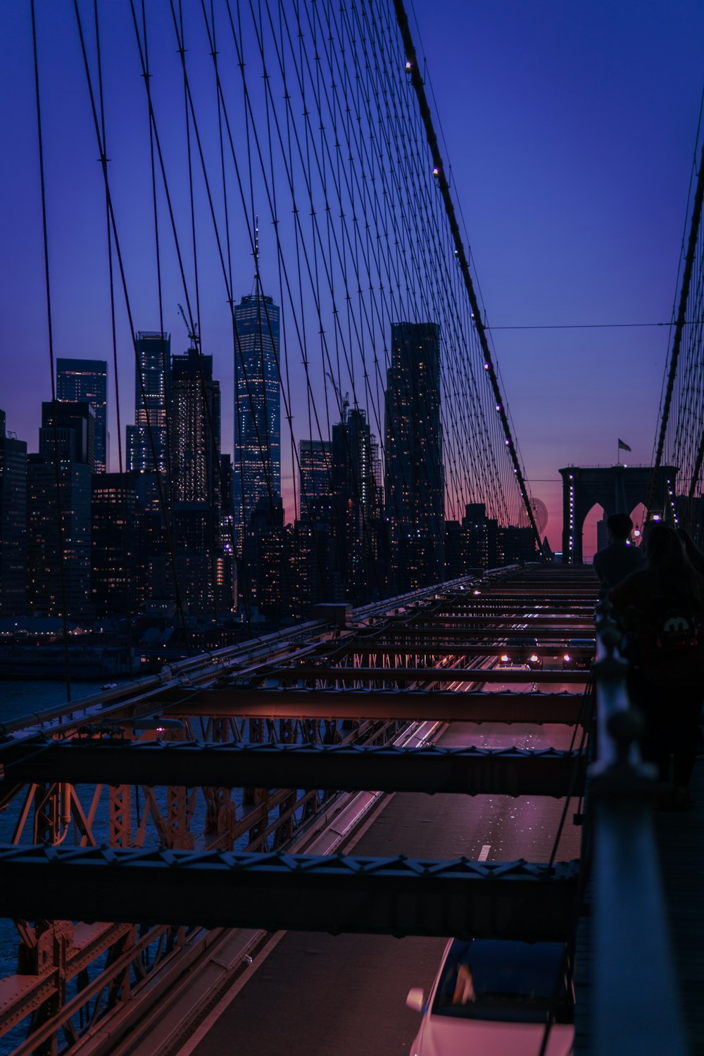 black and gray concrete bridge during night time