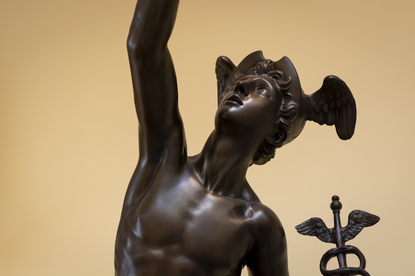 wooden man figurine mercury