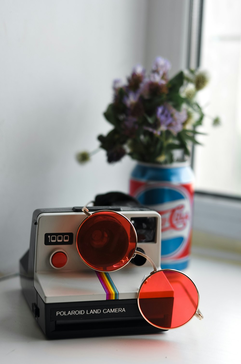 white Polaroid land camera
