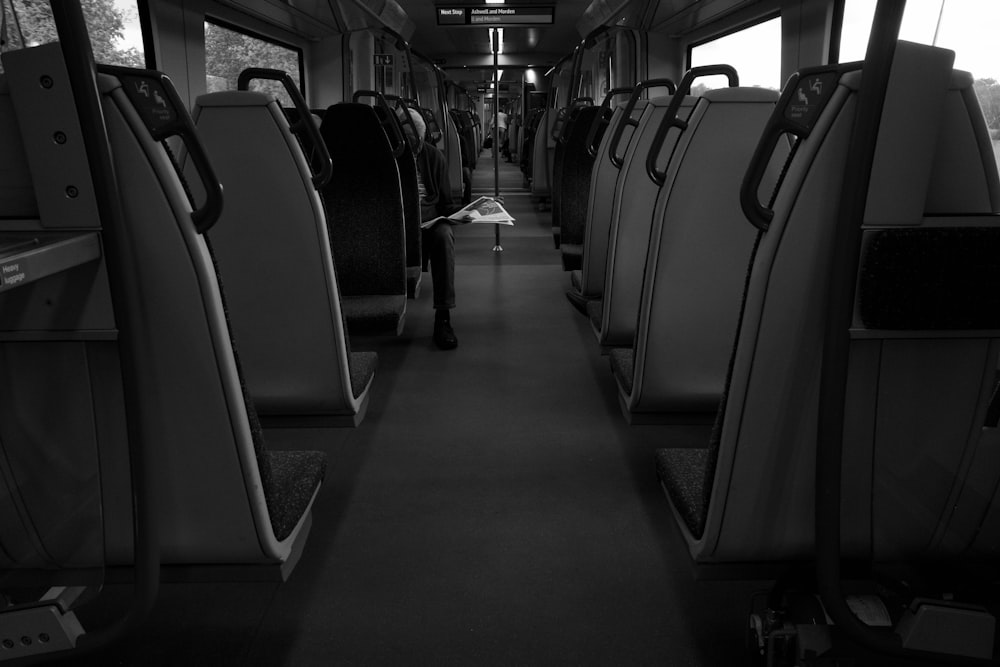 grayscale of a bus interior