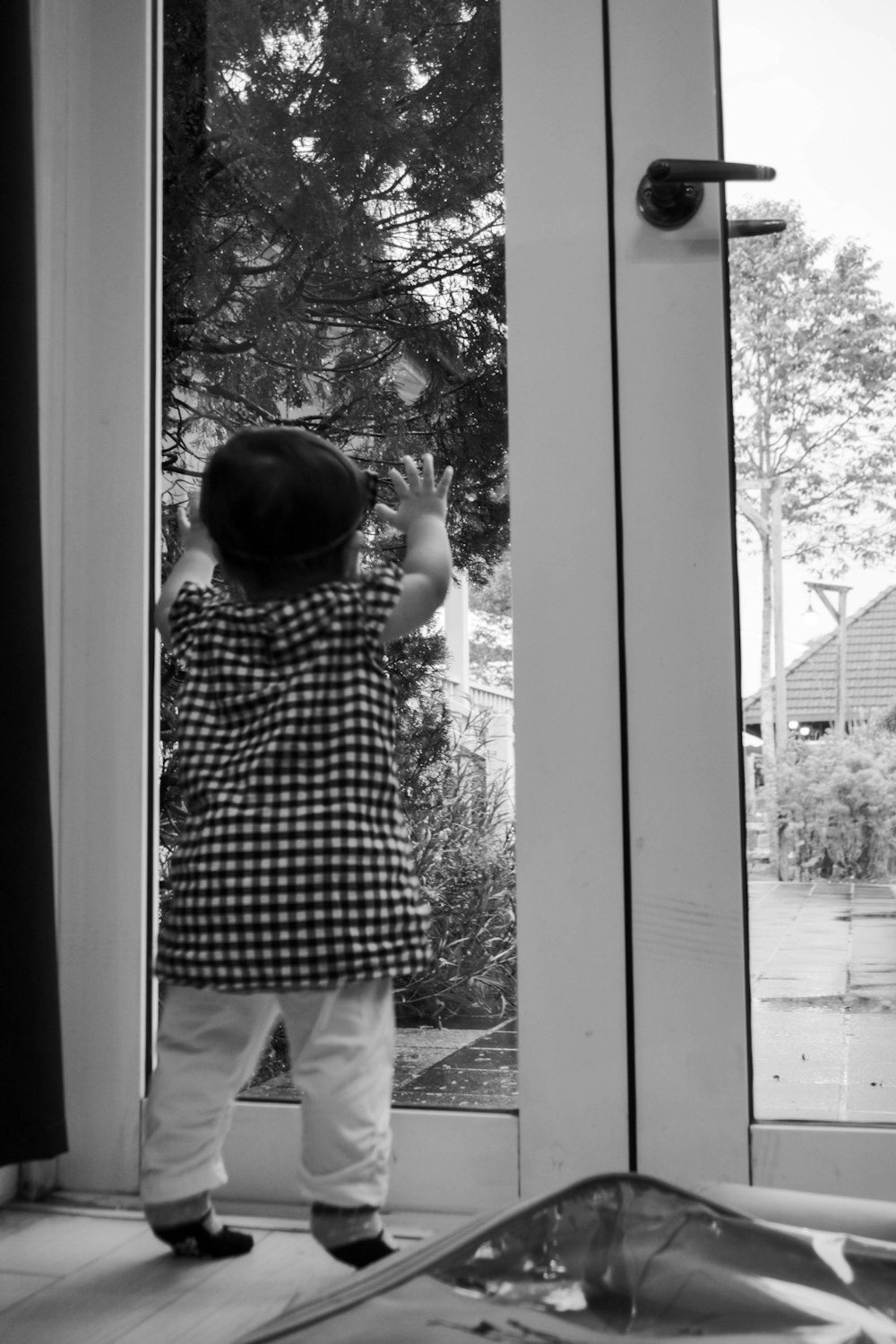 grayscale photo of a toddler