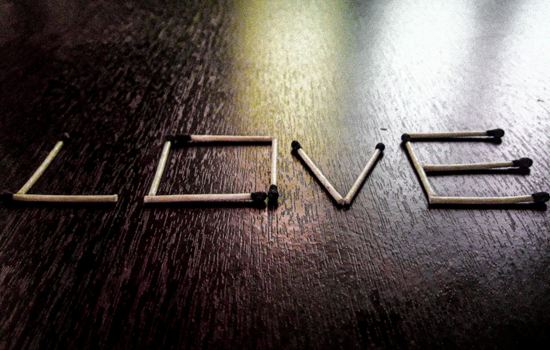 woman wearing yellow long-sleeved dress under white clouds and blue sky during daytime