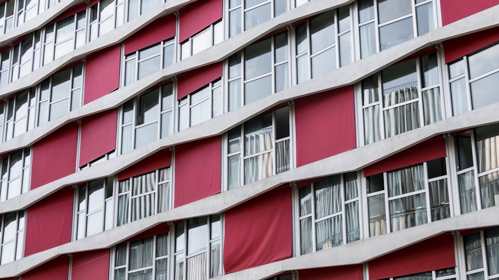 red and gray painted building windows