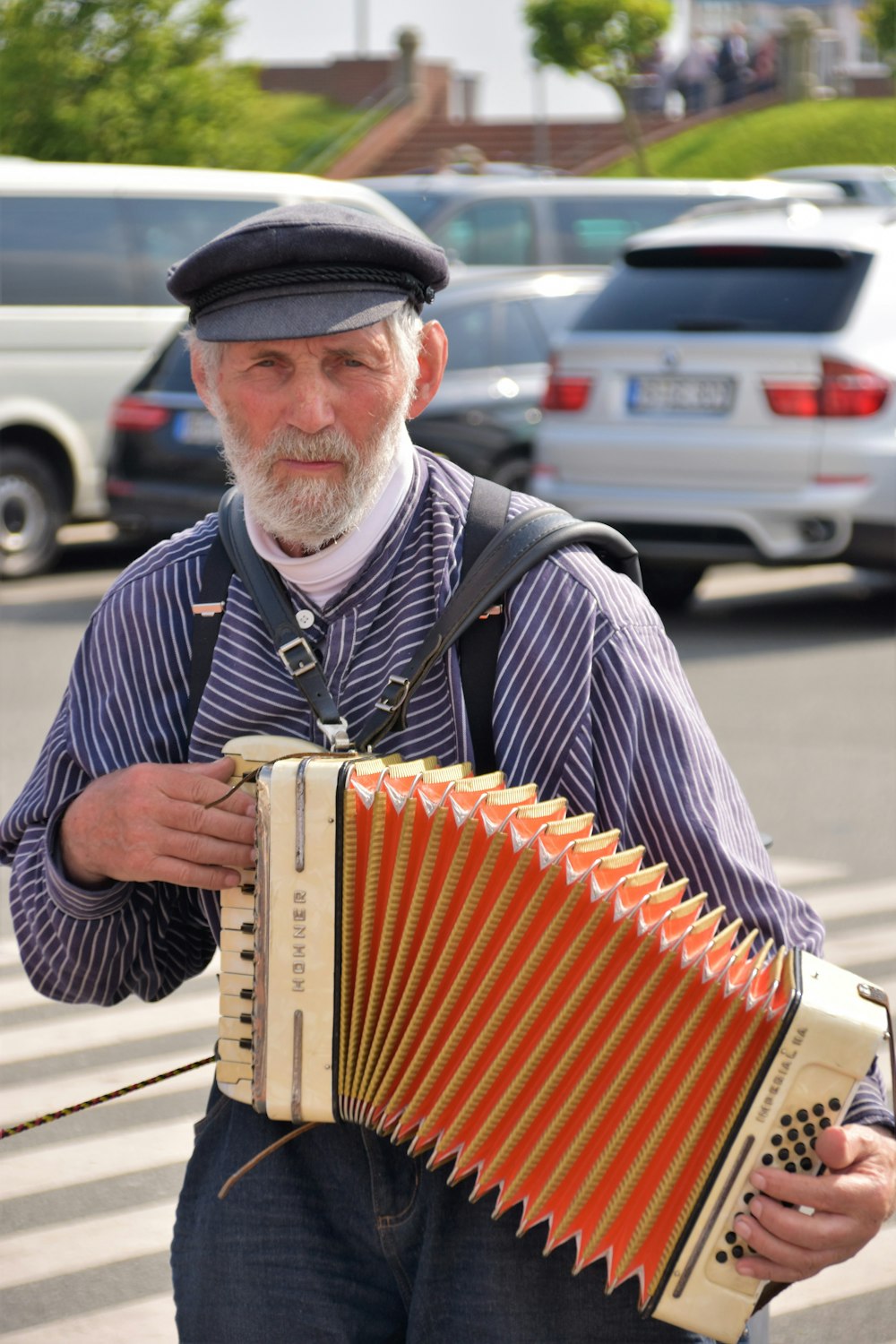 man holding accordion