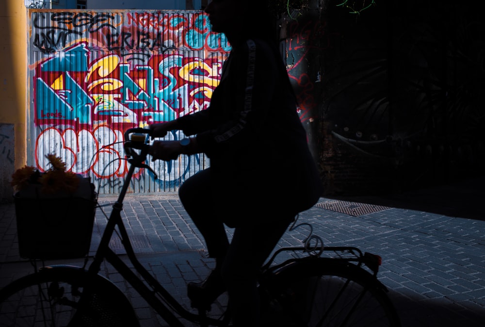 colorful graffiti on a gray metal wall