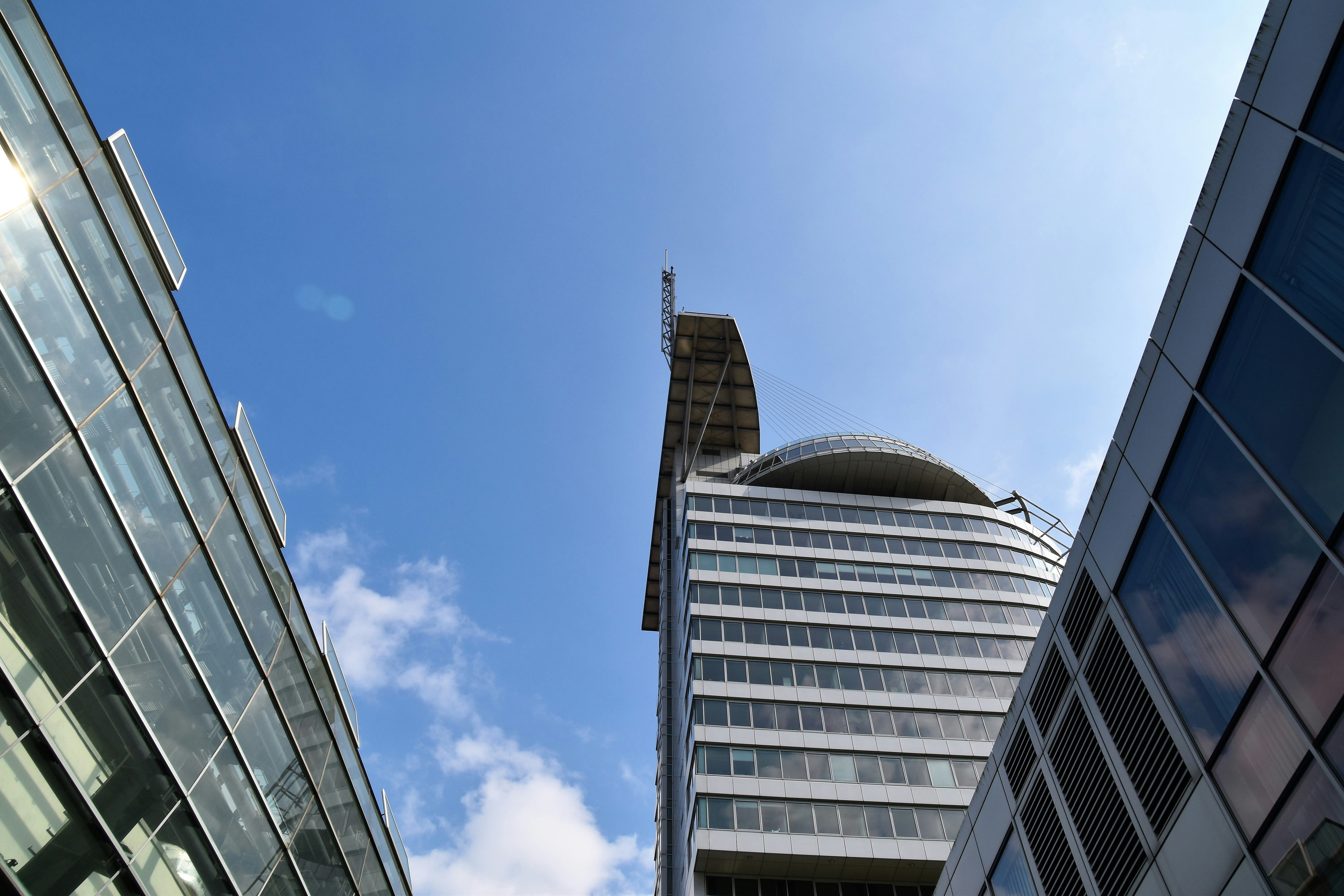 glass building under blue sky