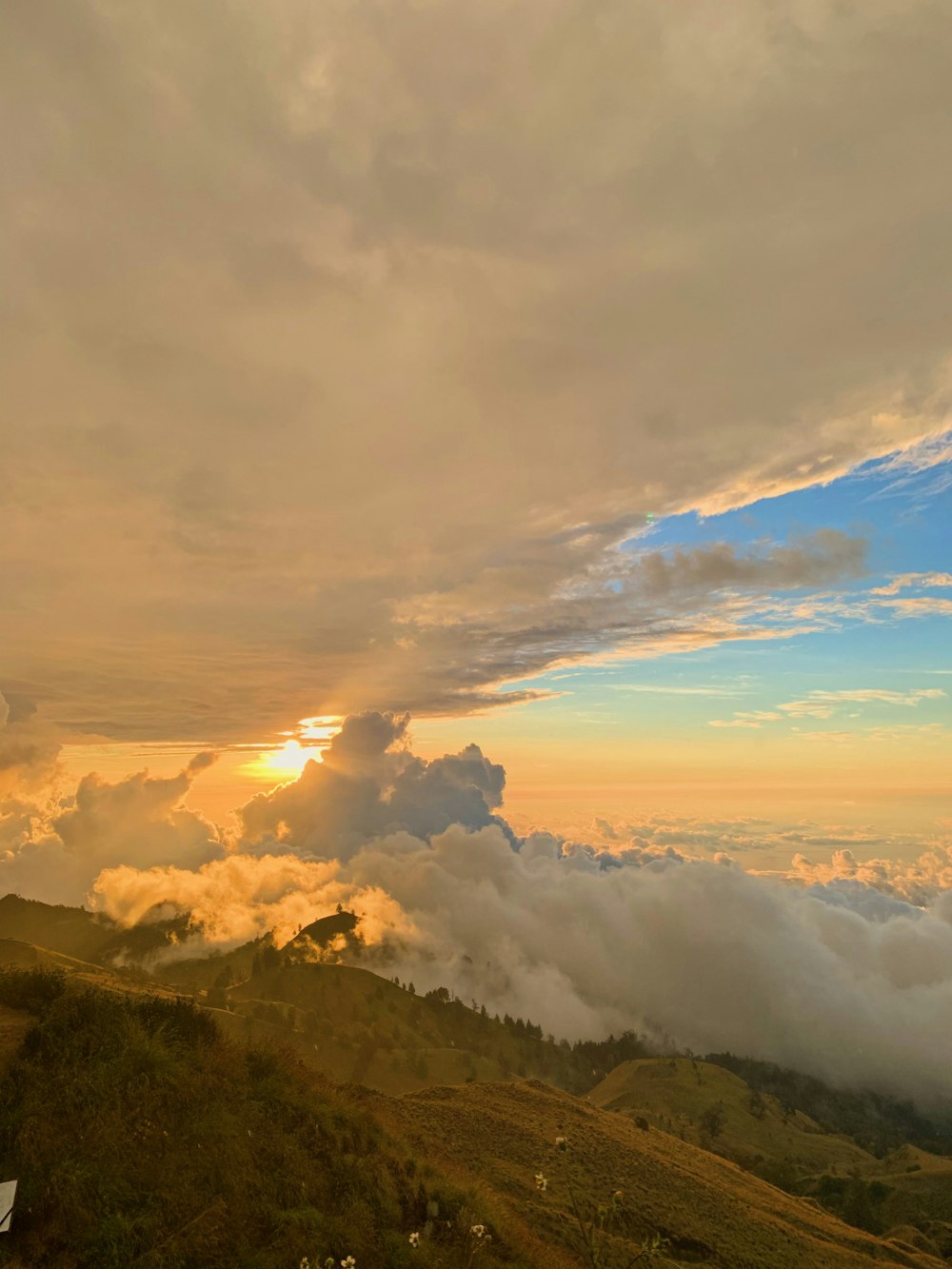 mountains under cloudy sky