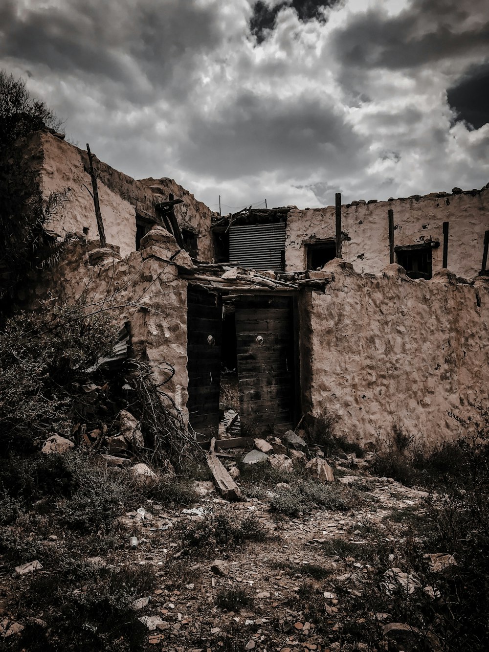 concrete building under cloudy sky