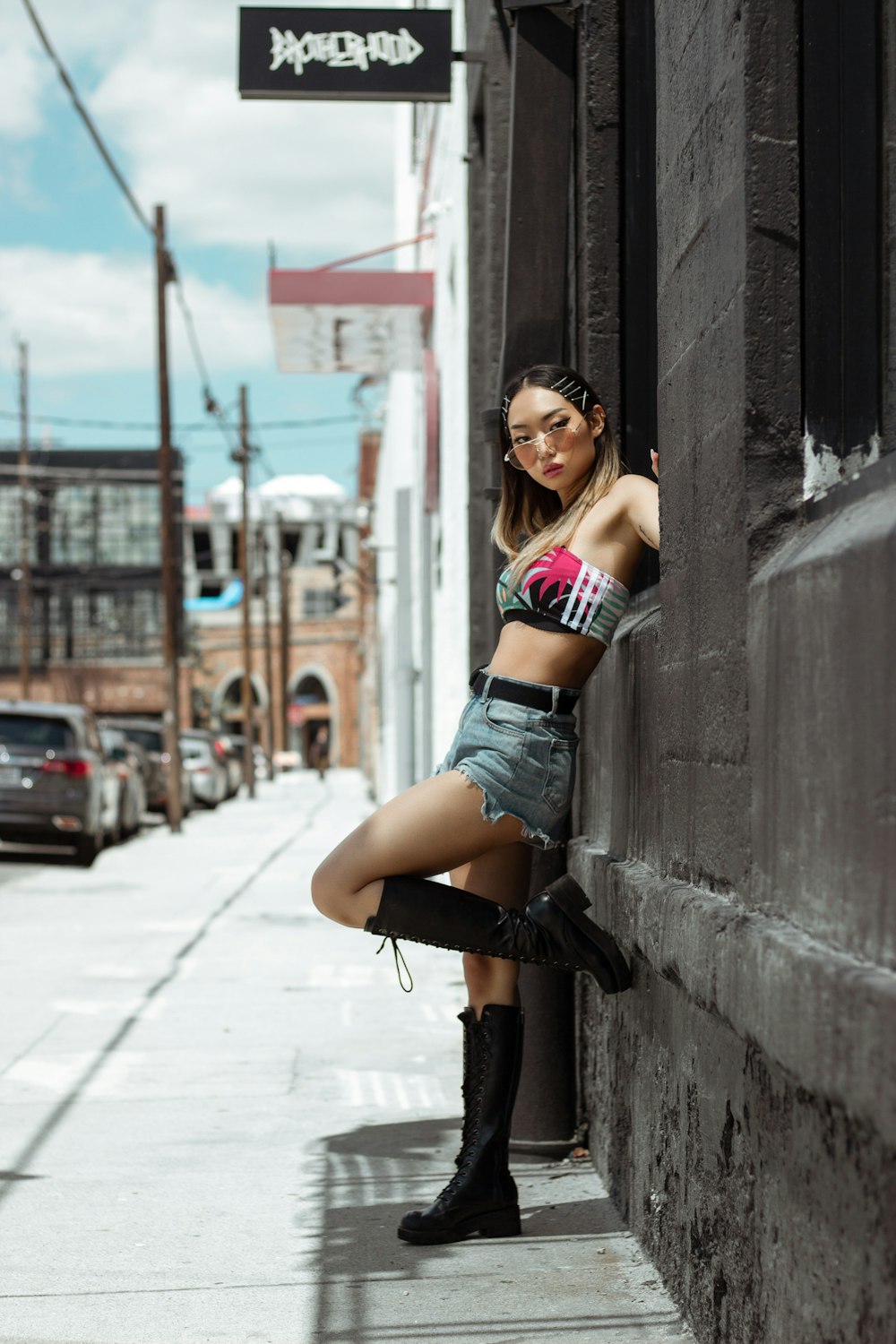 woman leaning on wall