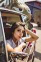 woman sitting inside vehicle