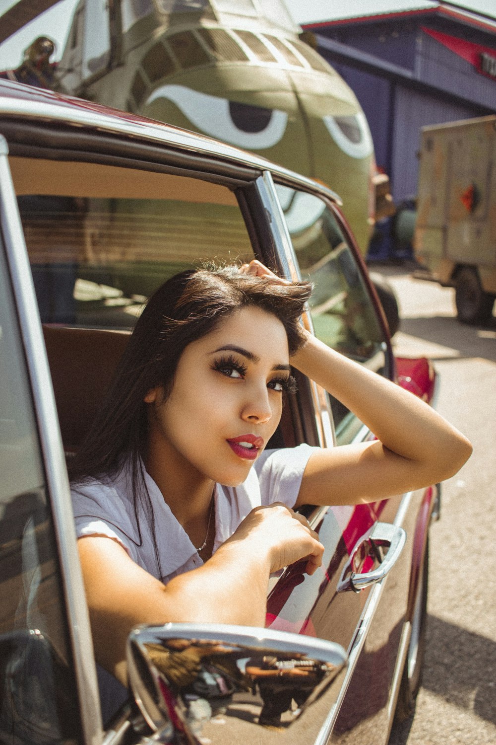 woman sitting inside vehicle