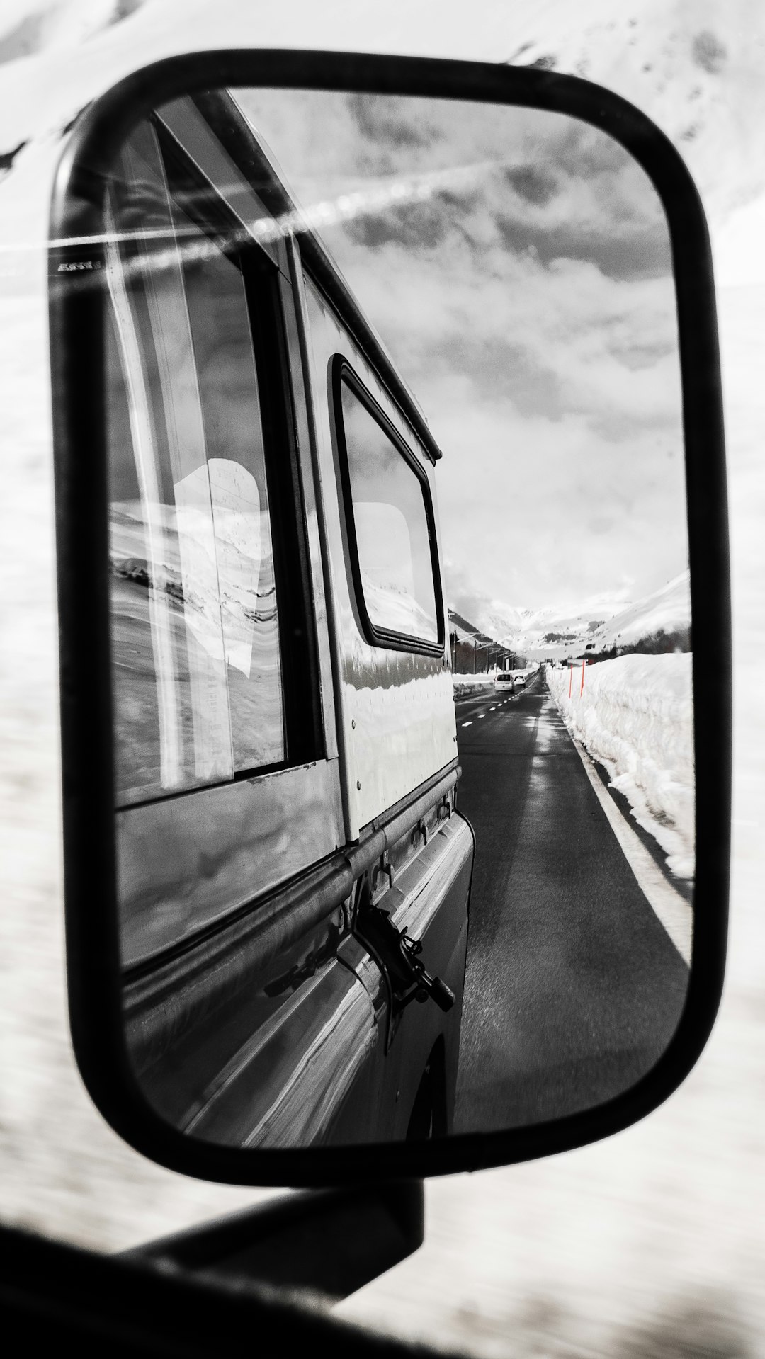 grayscale photo of wing mirror
