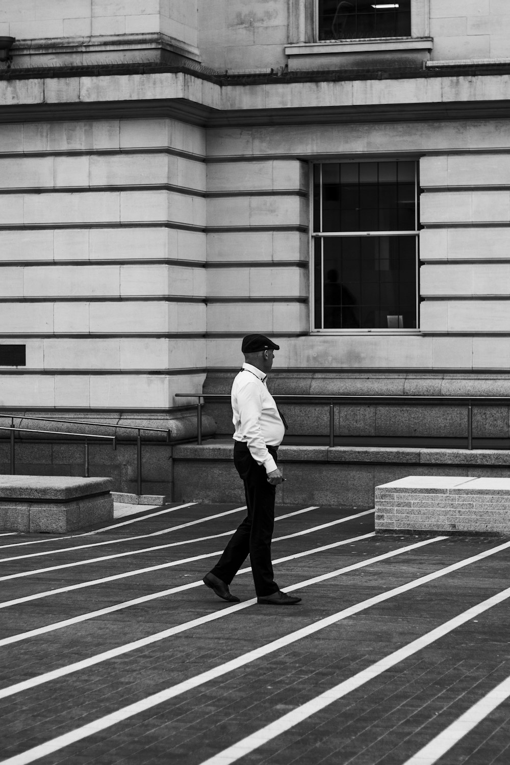 man standing in pathway