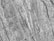 Textured surface with an intricate pattern of gray and white marble veining. The natural stone shows a detailed, organic flow of veins creating a complex and elegant appearance.