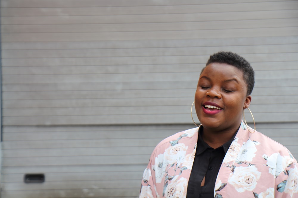 woman wearing pink blazer