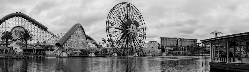 grayscale panoramic photography of Mickey Mouse ferris wheel