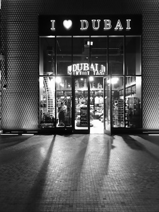 grayscale photo of I love Dubai store
