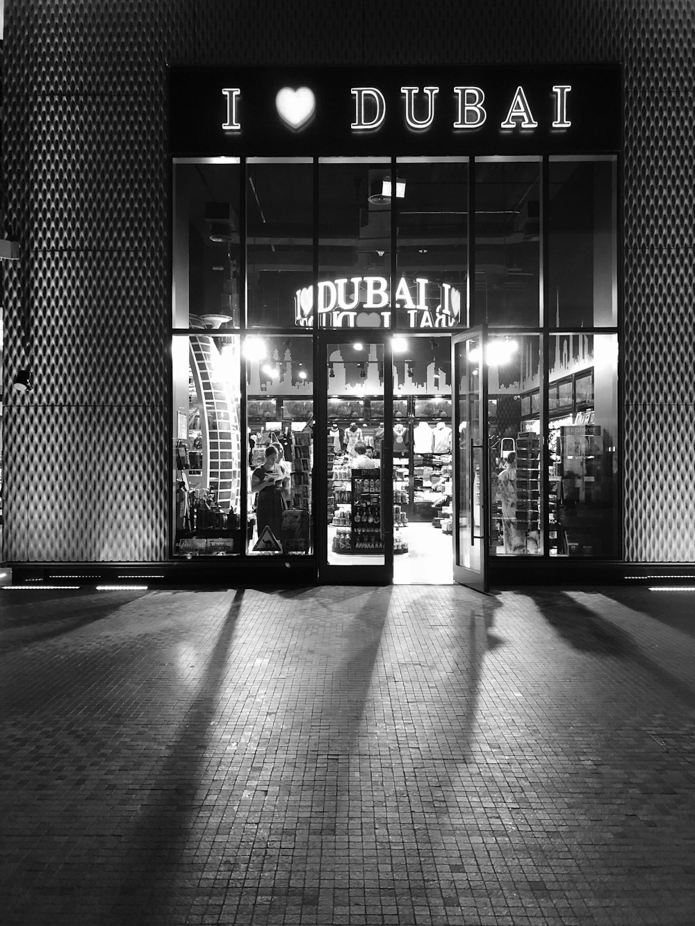 grayscale photo of I love Dubai store