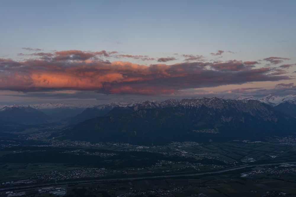 aerial photography of green mountain under cloudy sky during daytime