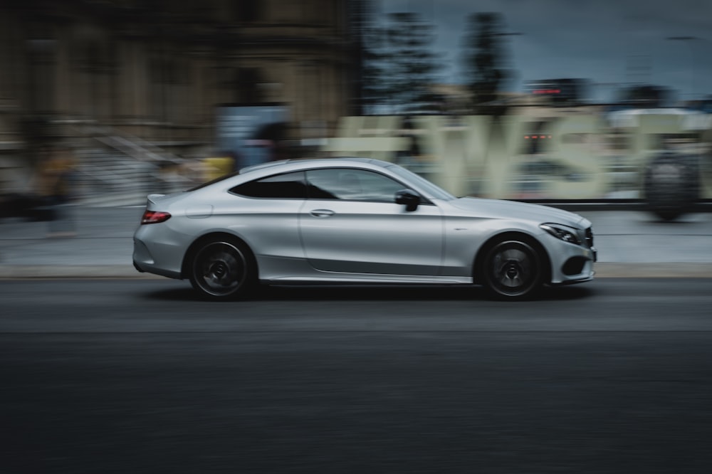 time lapse phot of silver car